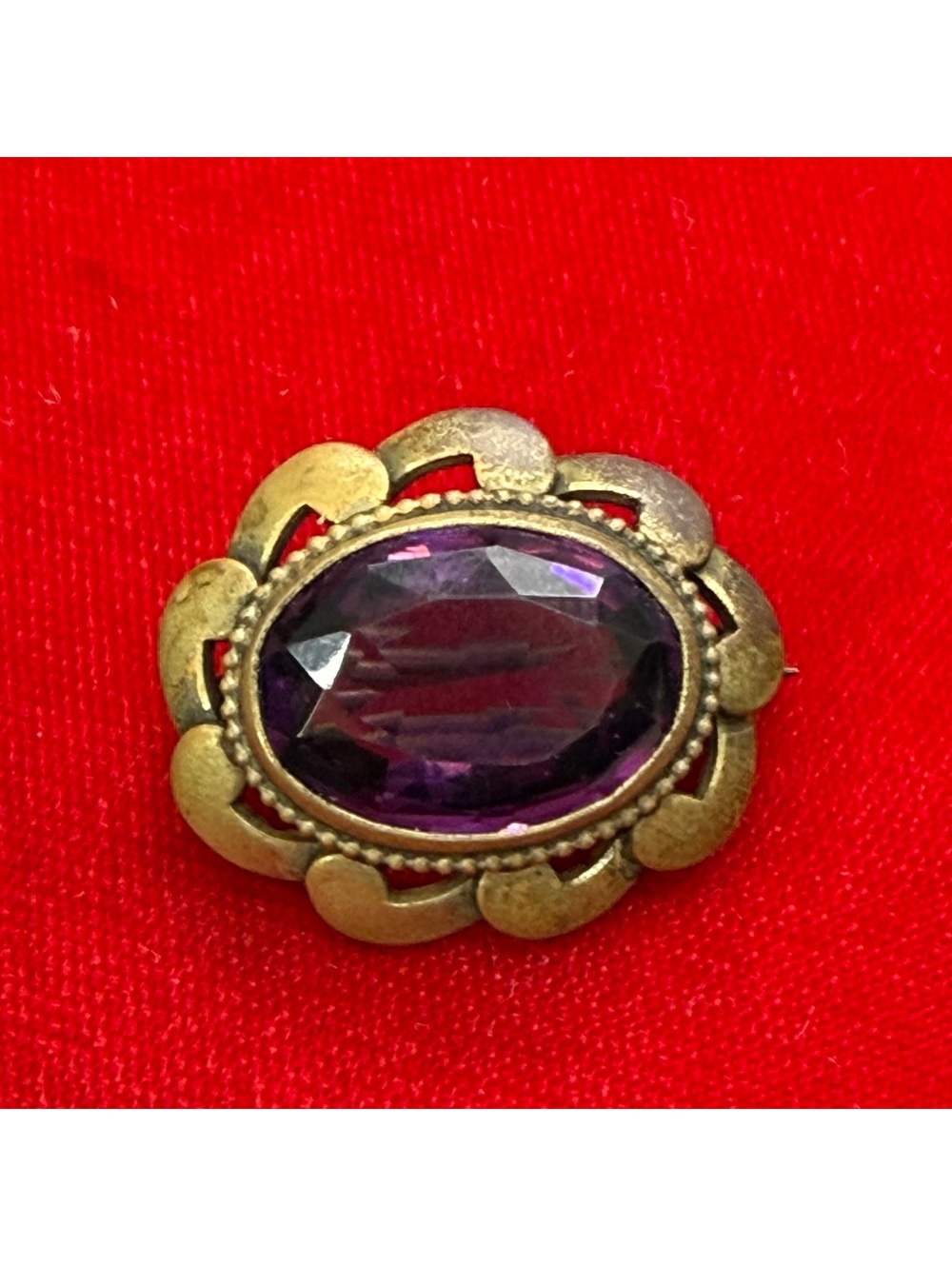 Purple paste stone in brass setting brooch antique/vintage